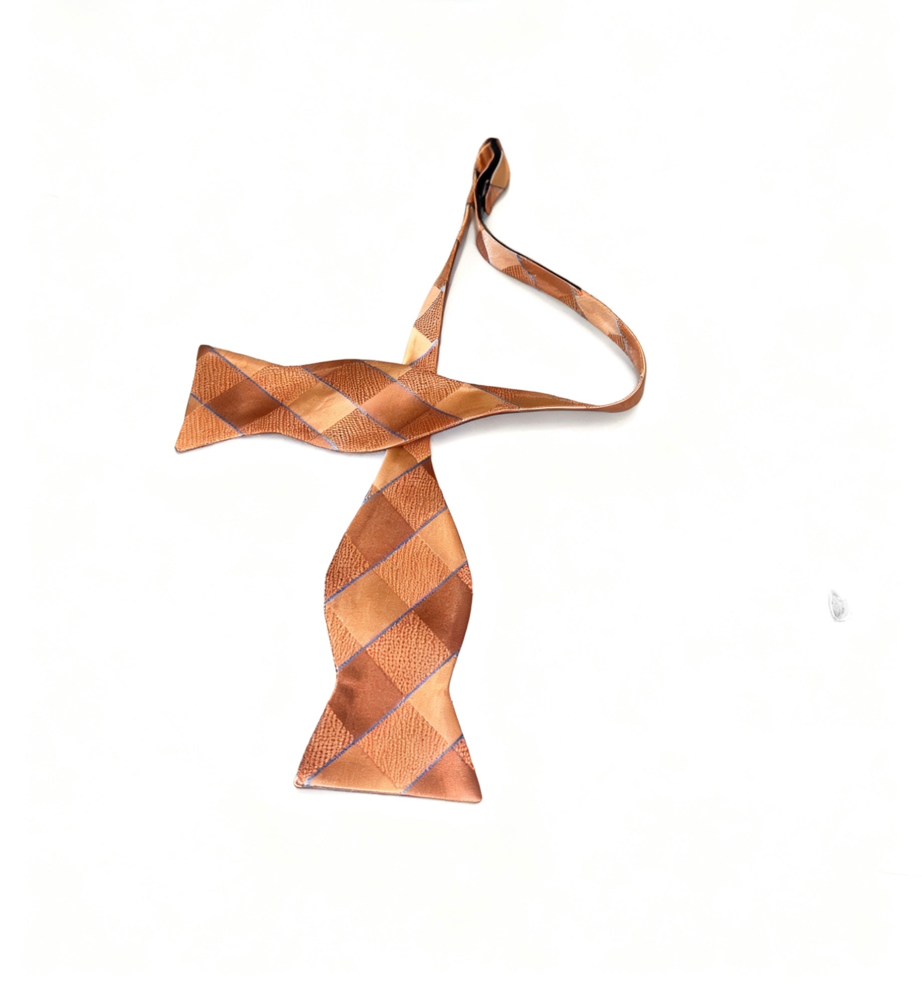 Brown checkered bow tie on a white background
